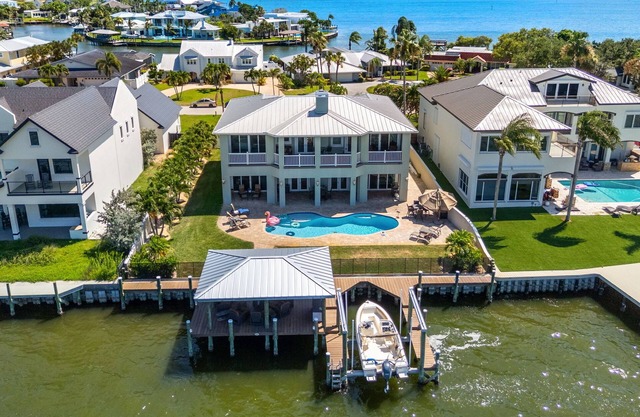 Gorgeous Direct Riverfront Pool Home W/Private Balcony, Movie Room, & Fire Pit!