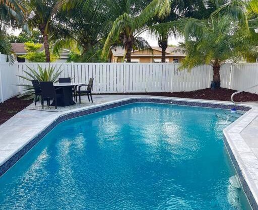 Gorgeous open concept 4 BR with heated pool and lounge area