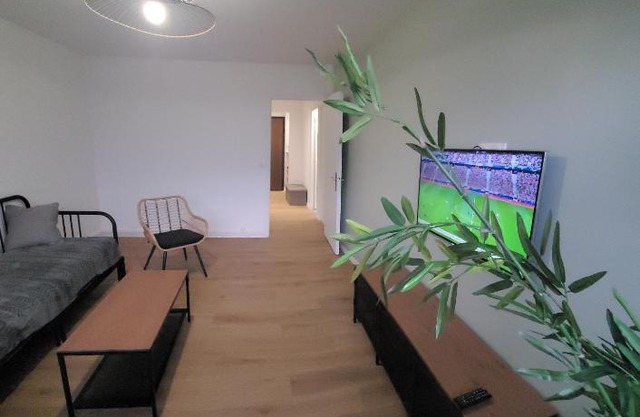 Grand appartement avec parking privé