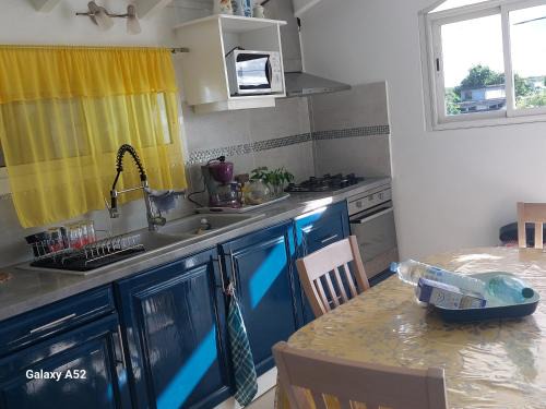 Haut de villa agréable et paisible climatise, wifi