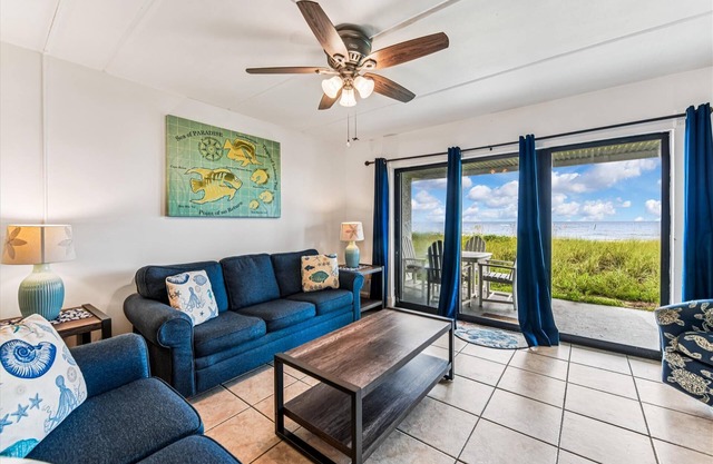 HEAR THE ROAR of the ocean and the slow flapping of the blue herons.