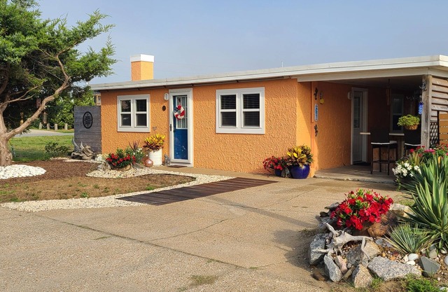 Historic Cottage Steps from the Beach and Dog Friendly!