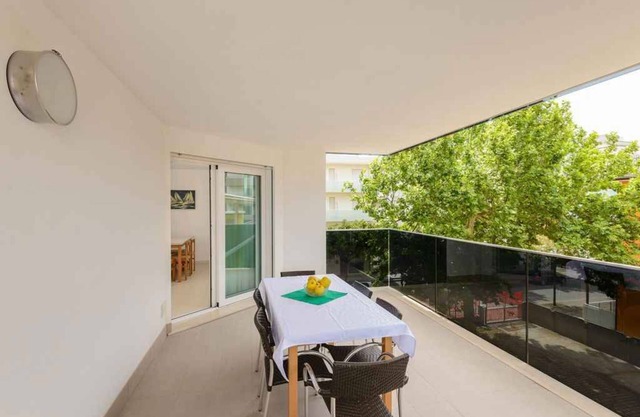 Holiday apartment with balcony and air conditioning