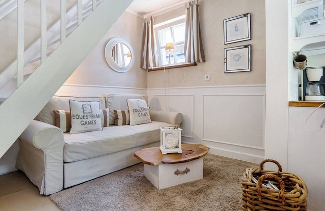 Holiday Apartment 'Gästewohnung Am See - Maisonette' with Private Terrace and Wi-Fi Near the Beach