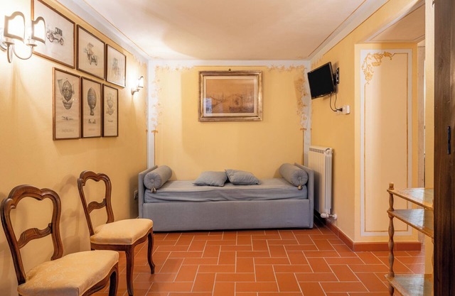 Holiday Apartment "Grillo Rosso Taverna" with Fireplace