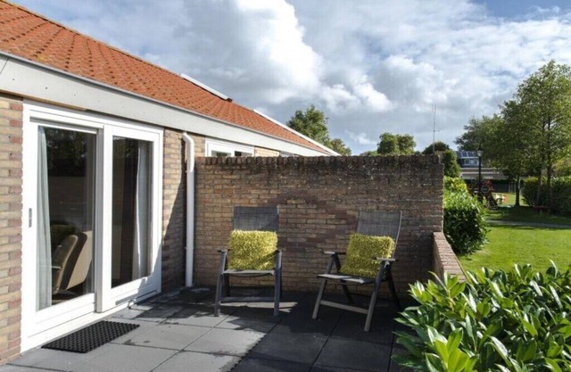 Holiday home in Nes with swimming pool