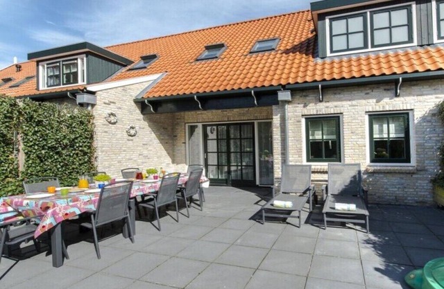 Holiday home in Nes with swimming pool