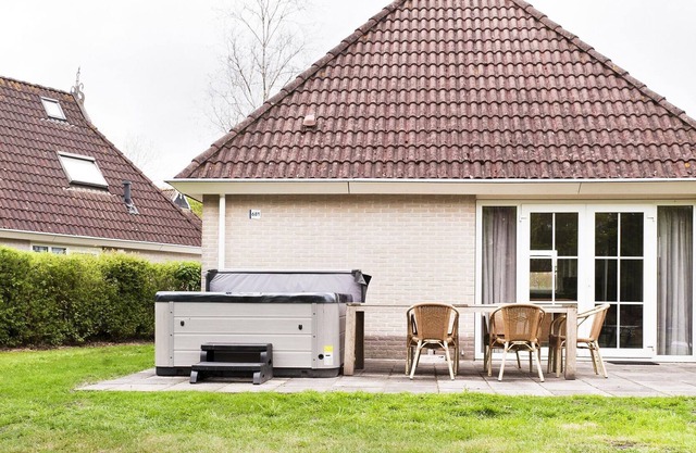 Holiday home on the water with sauna, outdoor spa and sloop