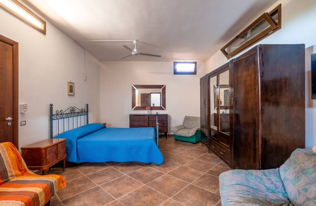 Holiday Home 'Rosso Pepe' with Private Terrace, Private Garden and Air Conditioning