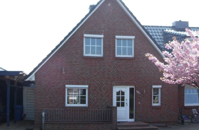 Holiday home with garden and parking space