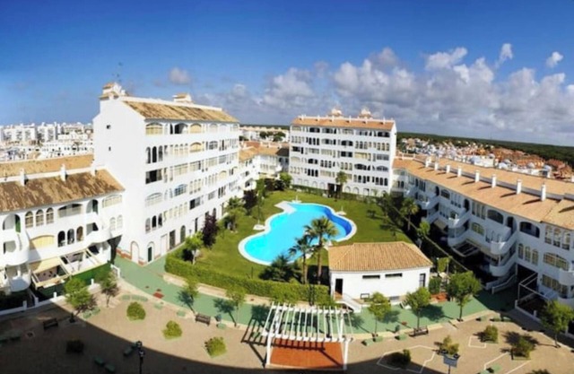 Homerez - Apt. El Portil, pool.