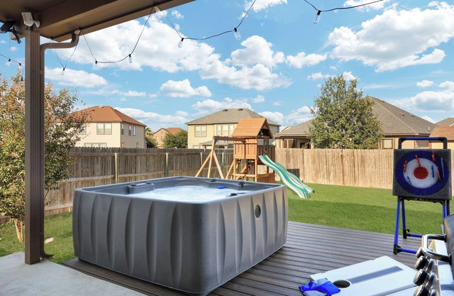 Hot Tub Retreat | Games BBQ Air Hockey Swing Set