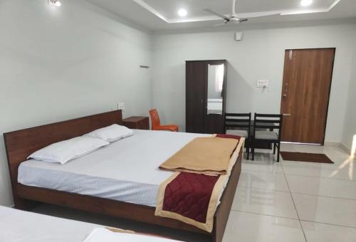 Hotel O Mini Bypass Nellore Road Formerly AMR Guest Inn