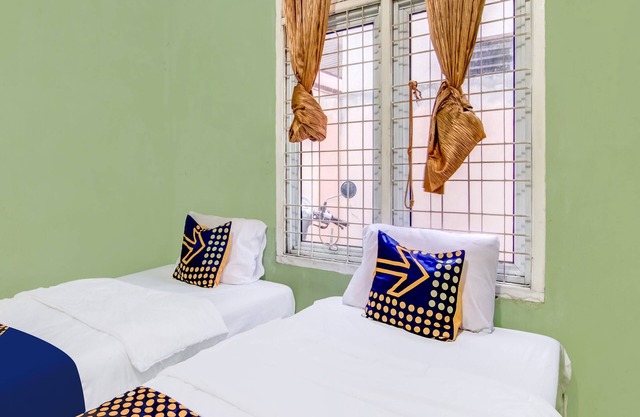 Hotel O Nayla Homestay Syariah Near Koro Koro Panam, Karaoke, Pool, & Cafe