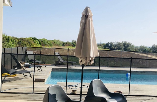 House between beach and mountains