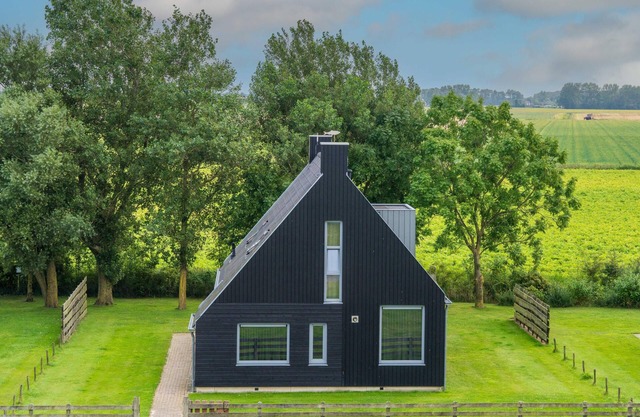House in the Friesian landscape by the Waddensea