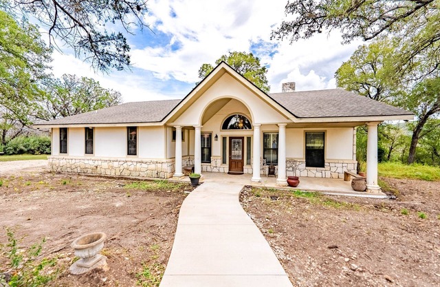 House on acreage with room to kick off your boots and relax