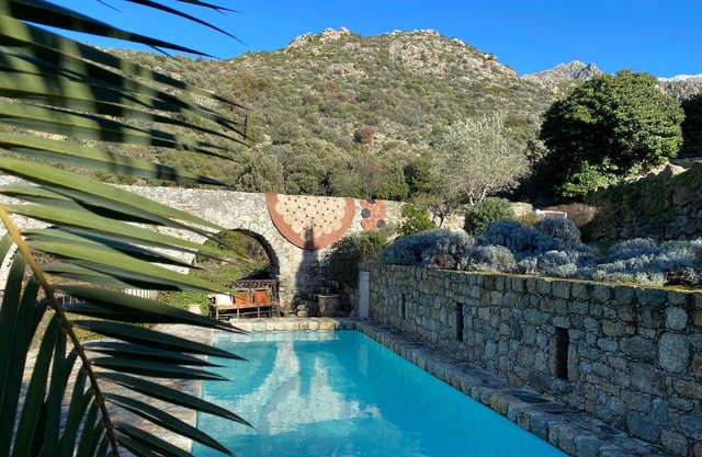 In the heart of Balagne, beautiful traditional building with heated pool
