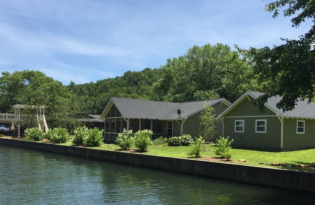 Jump into Lake Burton right out the back door of this water front home!