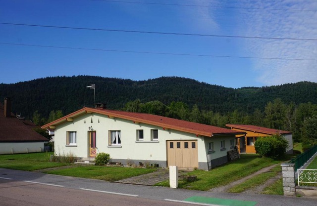 La maison et l'étang de pêche