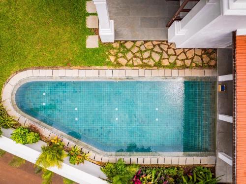 La Morella - 4BHK Luxury Villa in Assagao with Private Pool, Garden, Balcony, Caretaker, Kitchen, Genset Backup, Security