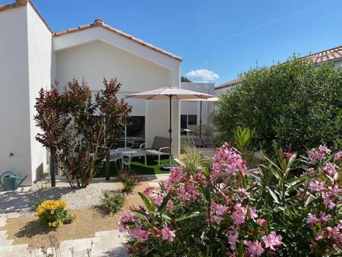 La petite maison zone coulée verte menant a l'océan