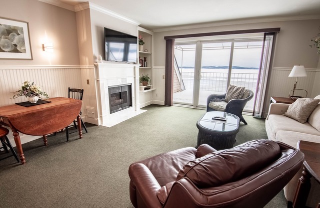 Lake Charlevoix Condo | Top-Floor Comfort | Fireplace | Private Beach Access