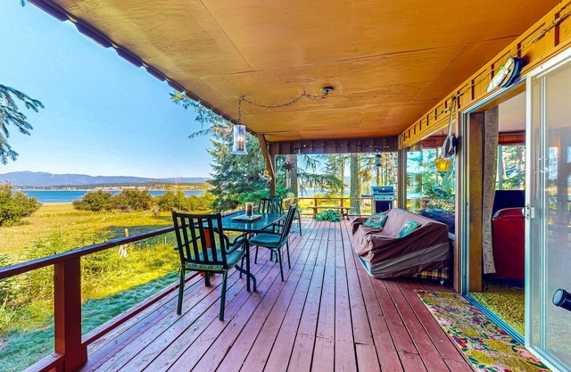 Lake-view dog-friendly home in great location with large deck, fireplace & grill