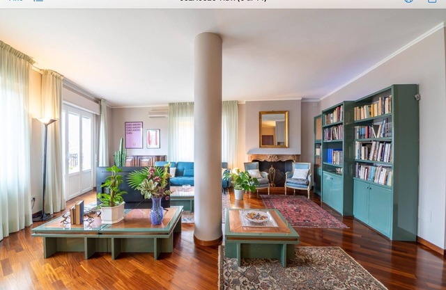 Large and bright penthouse in the heart of the city of Parma near the station