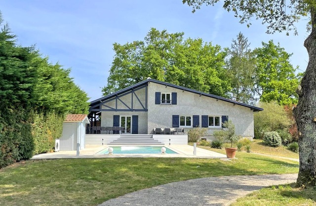 Large family villa with swimming pool and wooded grounds