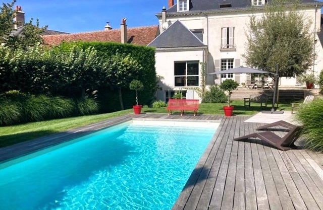 Large house with swimming pool on the banks of the Cher
