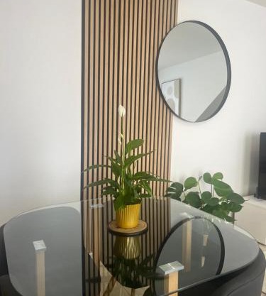 Le 24 appart rez-de-chaussée hyper-centre avec place de parking