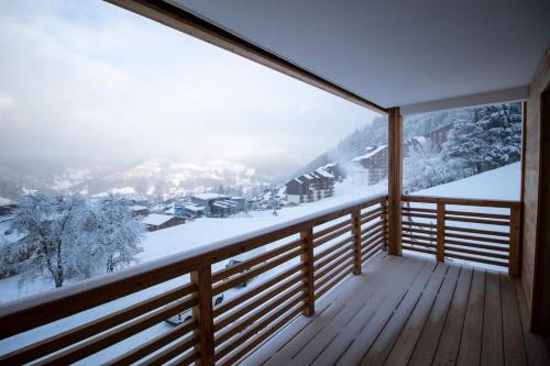 Le Balcon du Snow Roc - T4 confortable au pied des pistes, magnifique vue sur la vallée