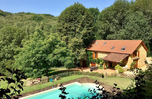 Les Brandes - Two delightful stone cottages, with huge garden and private pool.