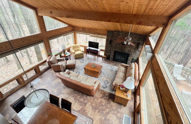 Lodge-style multi-level home at the Homestead in Glen Arbor. Deck with grill.