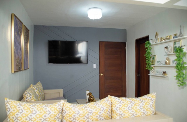 Lovely 3-bedroom building in Santiago with fitness room, WiFi, AC
