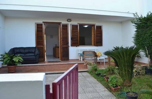 Lovely Holiday Apartment "Casa a Torre dell'Orso PT55" with Garden