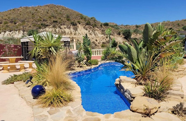Lovely villa with natural style swimming pool, fab outside area with great views