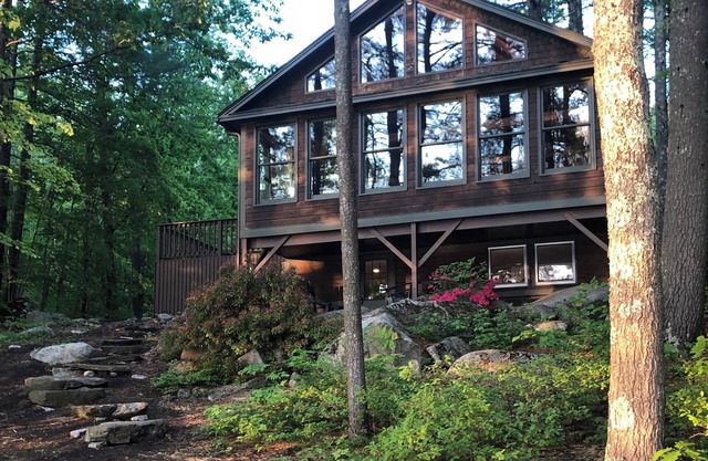 Lovely waterfront home on Panther Pond with private tennis/pickleball court!
