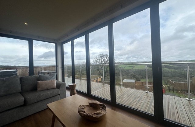 Luxurious 3 bedroom lodges with views over the lush green valley