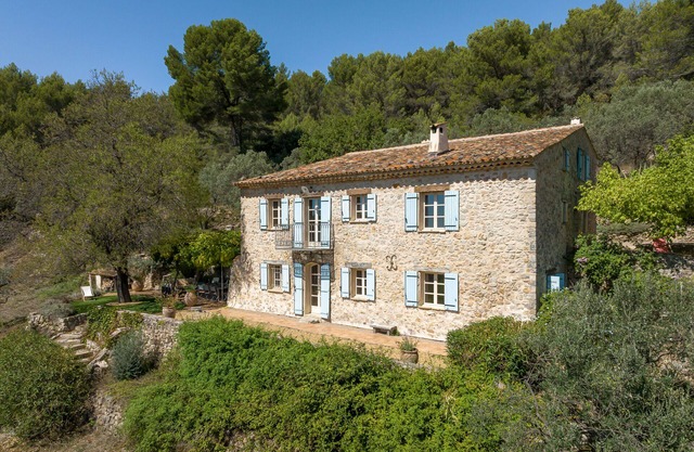 Luxurious restored farmhouse with olive grove, swimming pool, and superb views