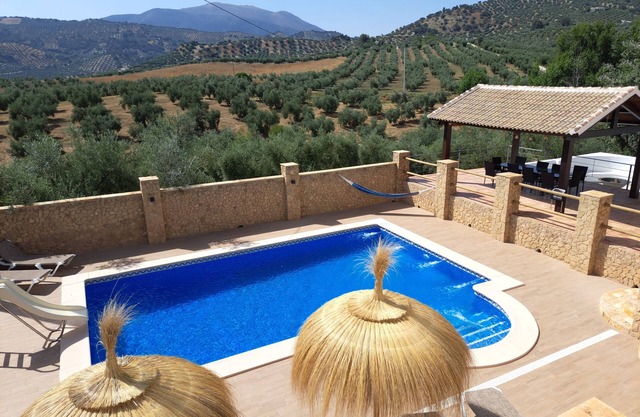 Luxurious villa nestled amongst olive groves with stunning mountain views.