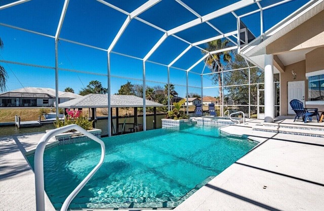 Luxury 4-Bedroom Canal Home with Pool