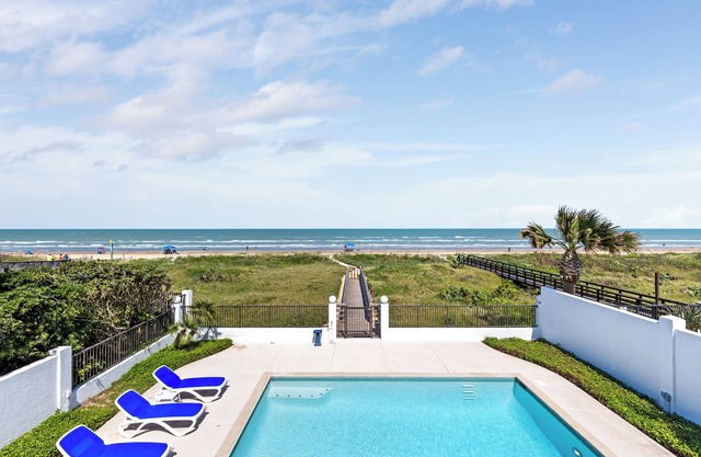 Luxury Beachfront Home w/private beach access & private heated pool!