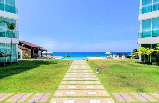 Luxury condo on private sandy beach