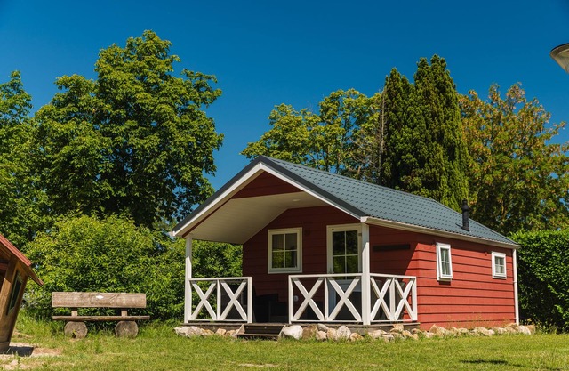 Luxury glamping is done in this colorful Scandinavian lodge.