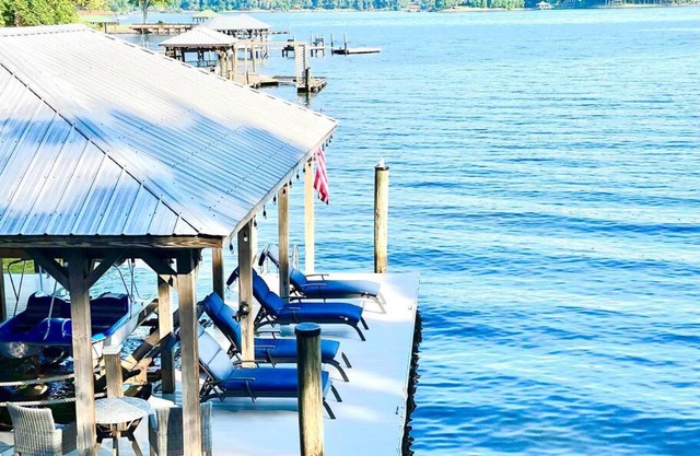 Luxury lakefront house with large private dock, game room, hot tub, water toys and more on Lake Norman