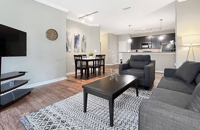 Luxury Living 2 BR with Private Garage & Pond Views