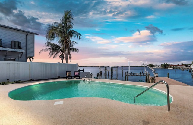 Luxury Waterfront Farmhouse Retreat w/Saltwater Pool, Dock & Tiki Bar