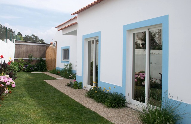 Magnificent villa with garden next to the beach